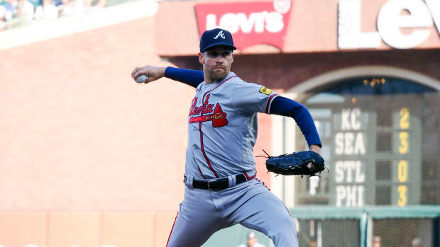 Aug 27, 2023; San Francisco, California, USA; Atlanta Braves relief pitcher Collin McHugh (32) pitches the ball against the San Francisco Giants during the sixth inning at Oracle Park.